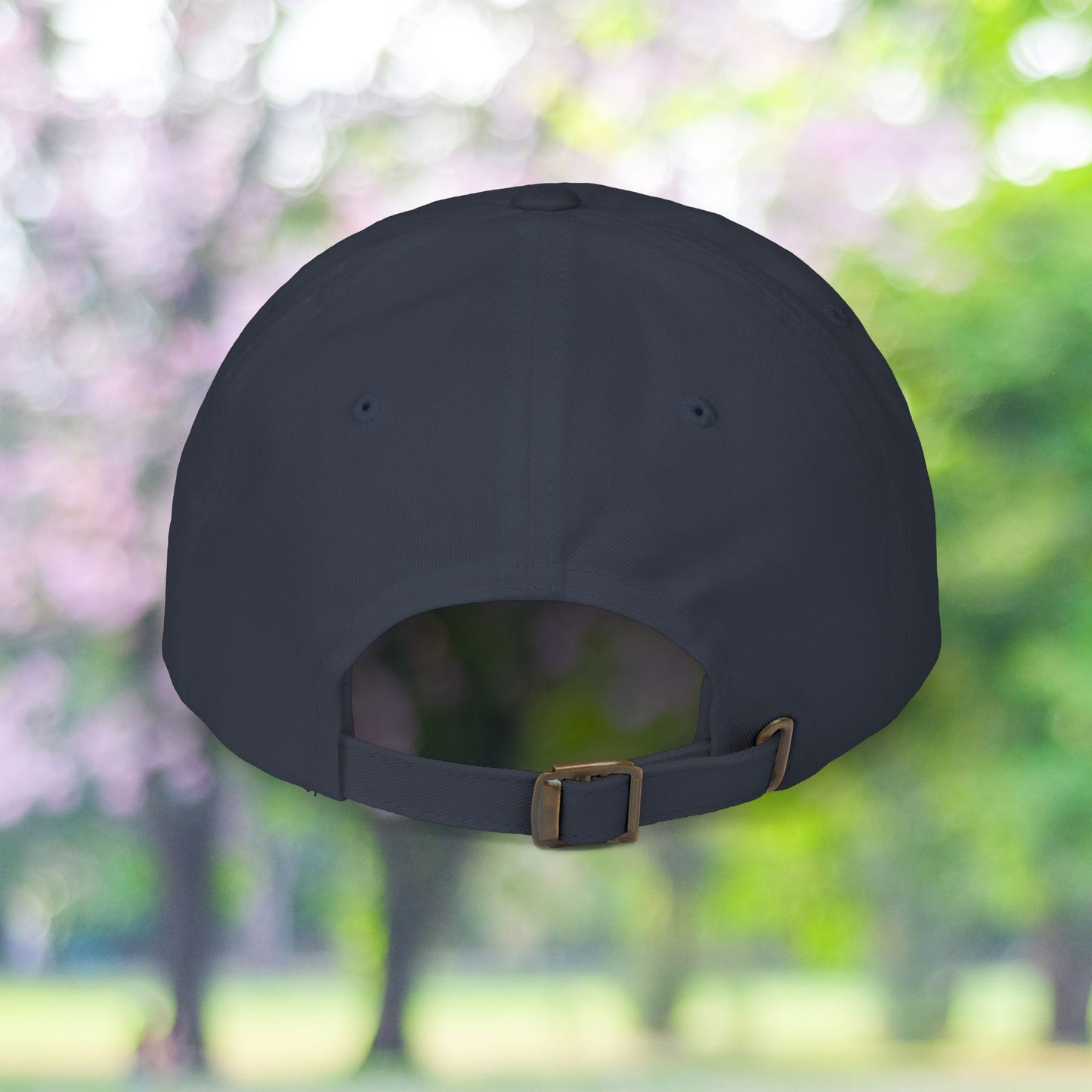 Back view of classic style baseball hat with adjustable strap.