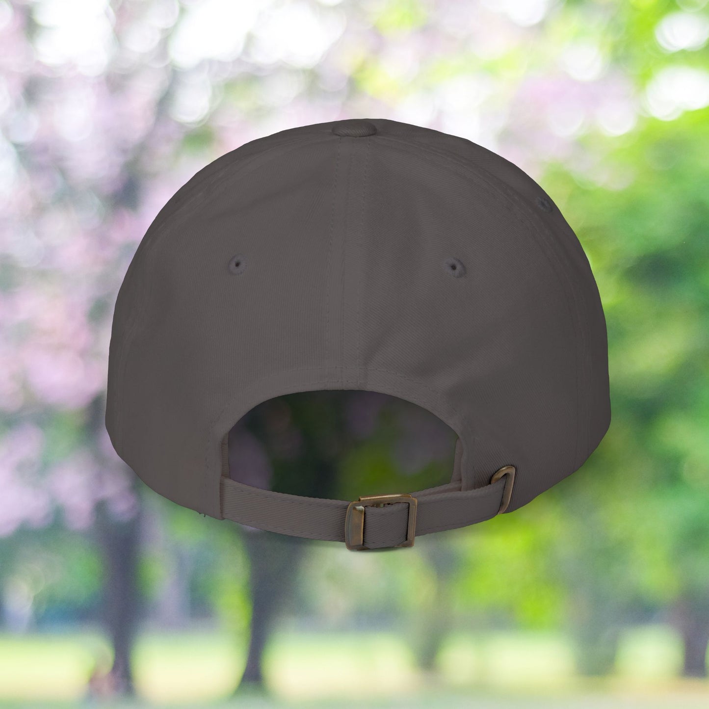 Back view of vintage style baseball hat with stay present strap.
