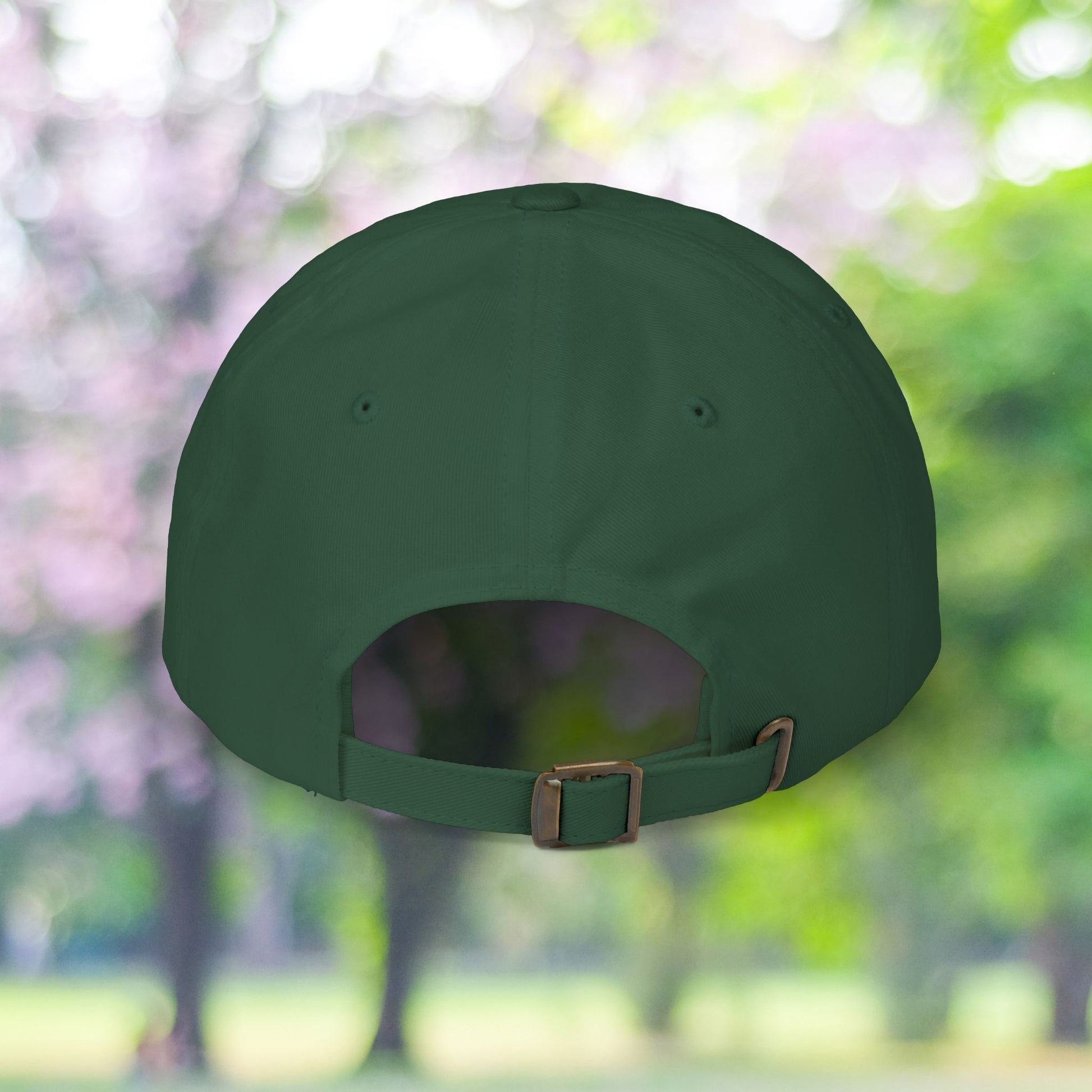 Back view of a dark green vintage style baseball hat with adjustable strap.