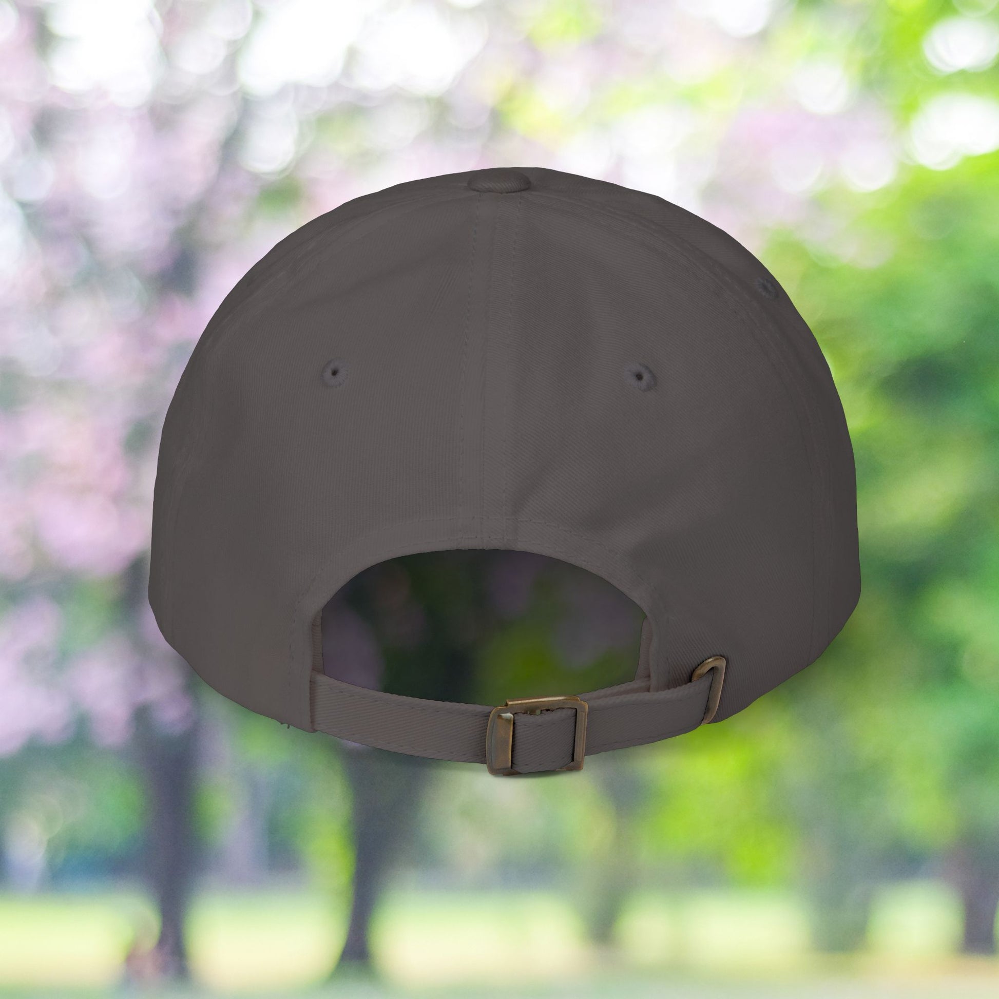 Back view of vintage style baseball hat with stay present strap.